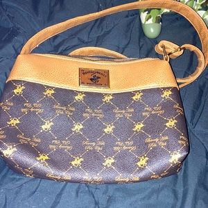 A shoulder purse slightly used just need gone